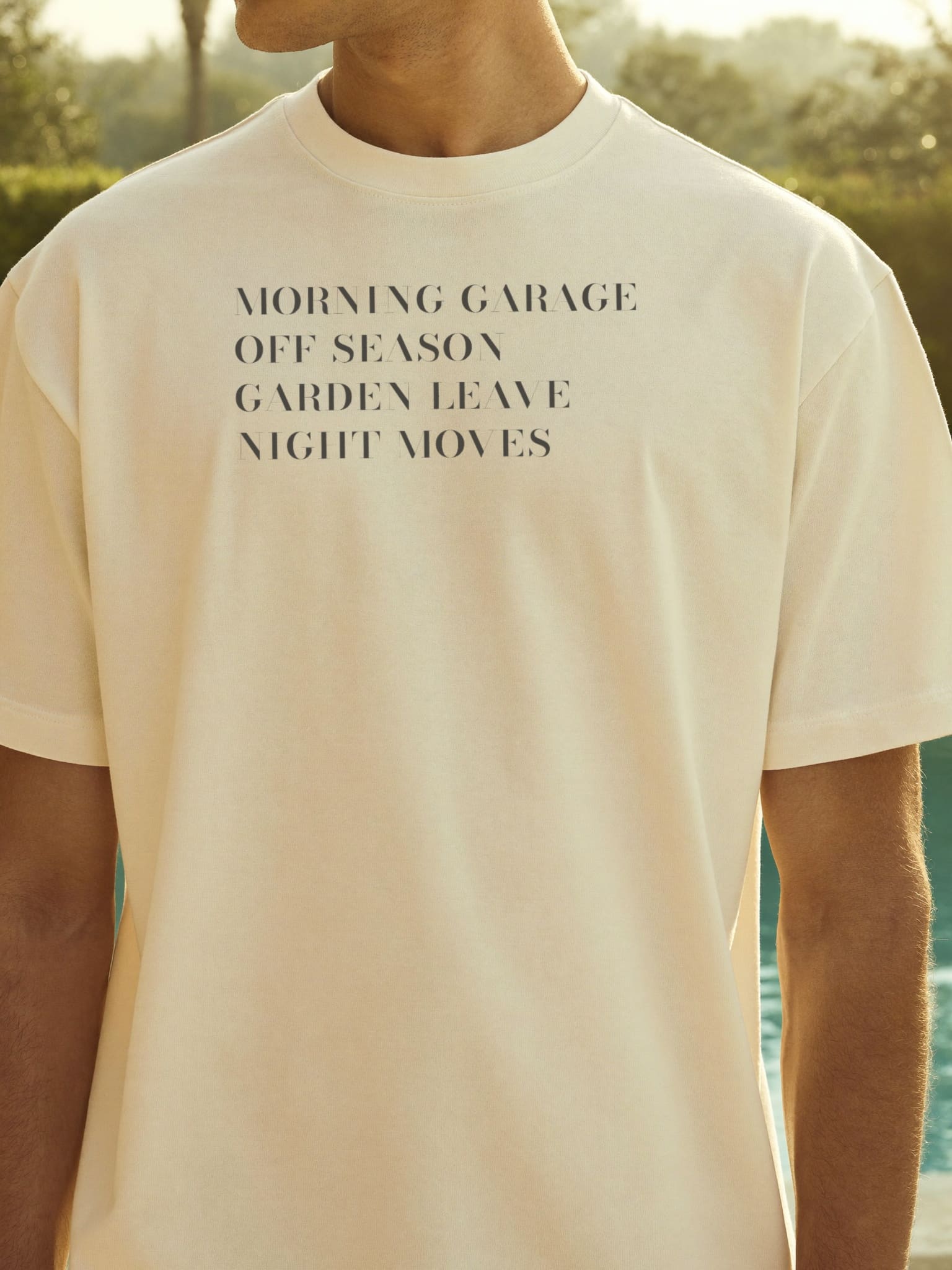The live garment, worn by the villa pool at midday.