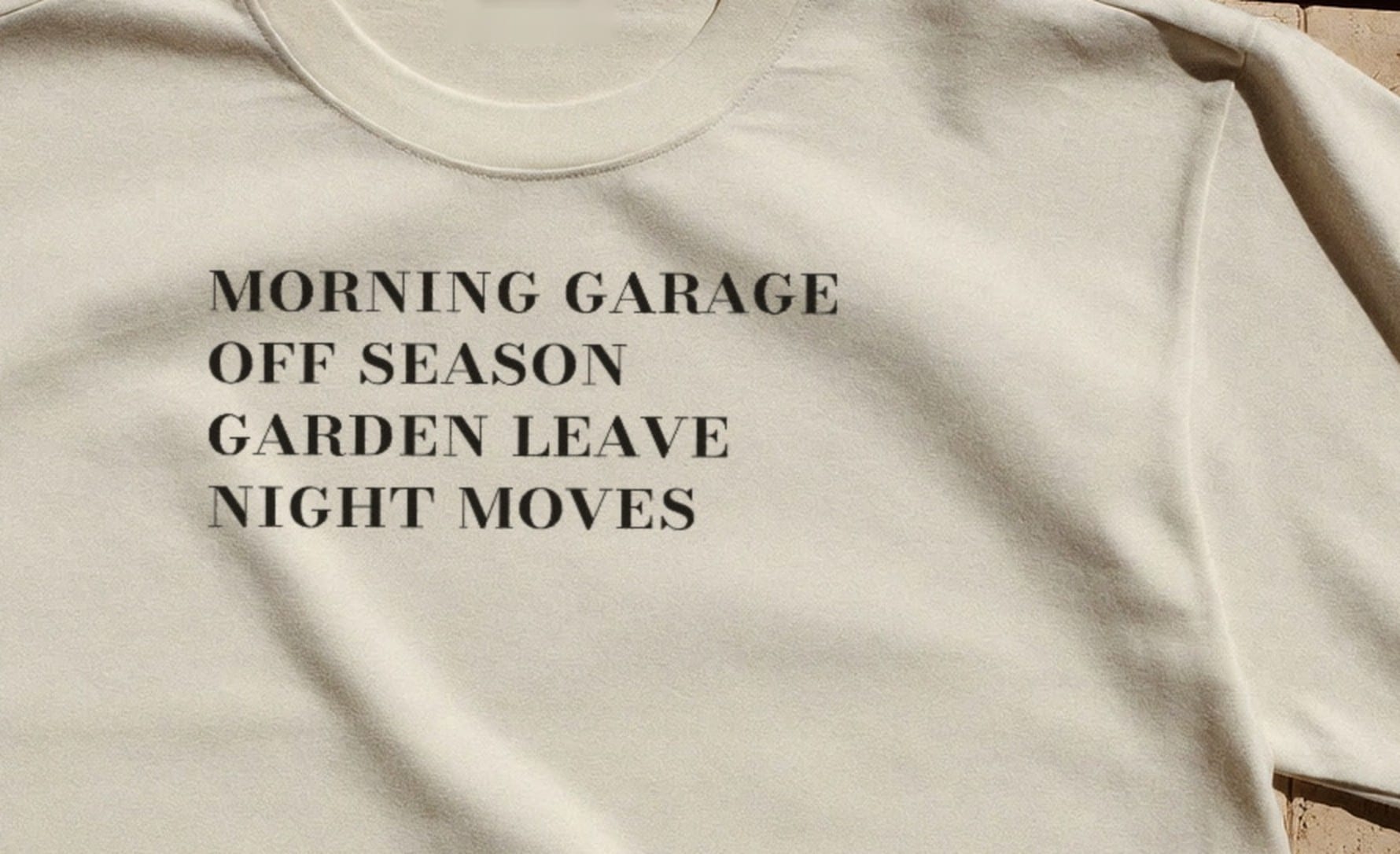 The index ink up close — the screen sits on the cloth and the weave reads through the letters